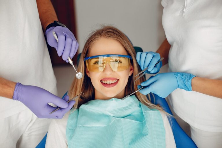 beautiful-girl-sitting-dentist-s-office_1157-21017
